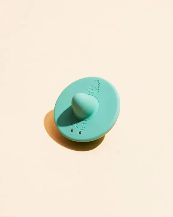 Gode vibrant waterproof en silicone turquoise, design ergonomique et sensation douce.