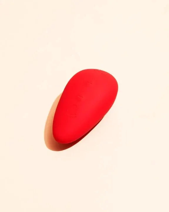 Stimulateur clitoridien rechargeable rouge en silicone.