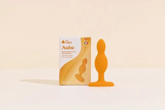 Plug anal en silicone orange doux, parfait pour une stimulation intime, haut de gamme et adaptable, offrant confort et plaisir.