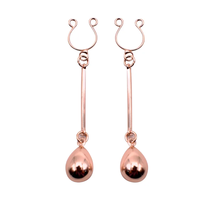 Bijou pince téton, forme perle doré rose