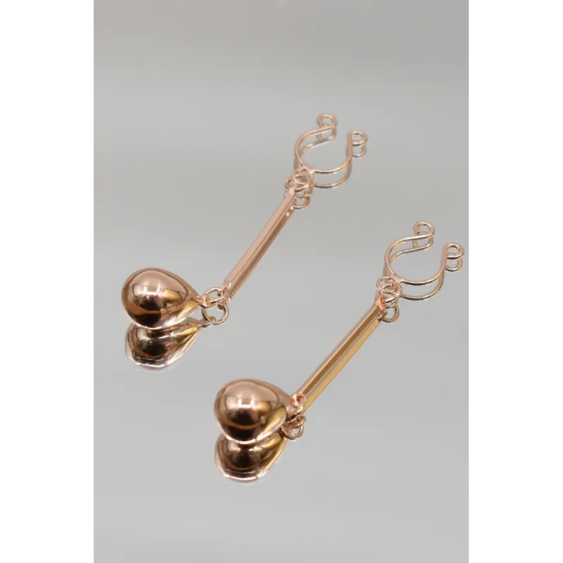 Bijou pince téton, forme perle doré rose