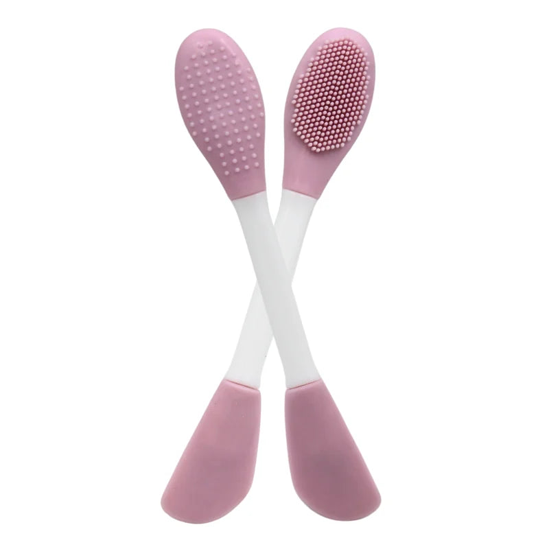 Spatule brosse visage à double face rose