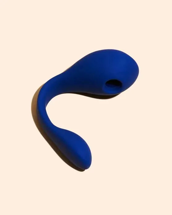 Vibromasseur en silicone bleu ergonomique pour stimulation intime.