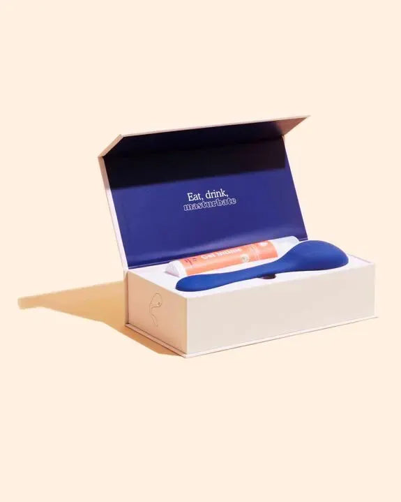 Coffret vibrateur bleu élégant avec lubrifiant intime orange, plaisir discret et raffiné pour moments de détente sensuelle.