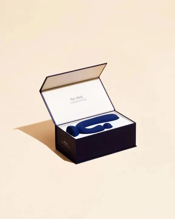 Vibromasseur bleu en silicone luxe, design élégant, boîte cadeau raffinée. Idéal plaisir intime et découverte sensuelle.