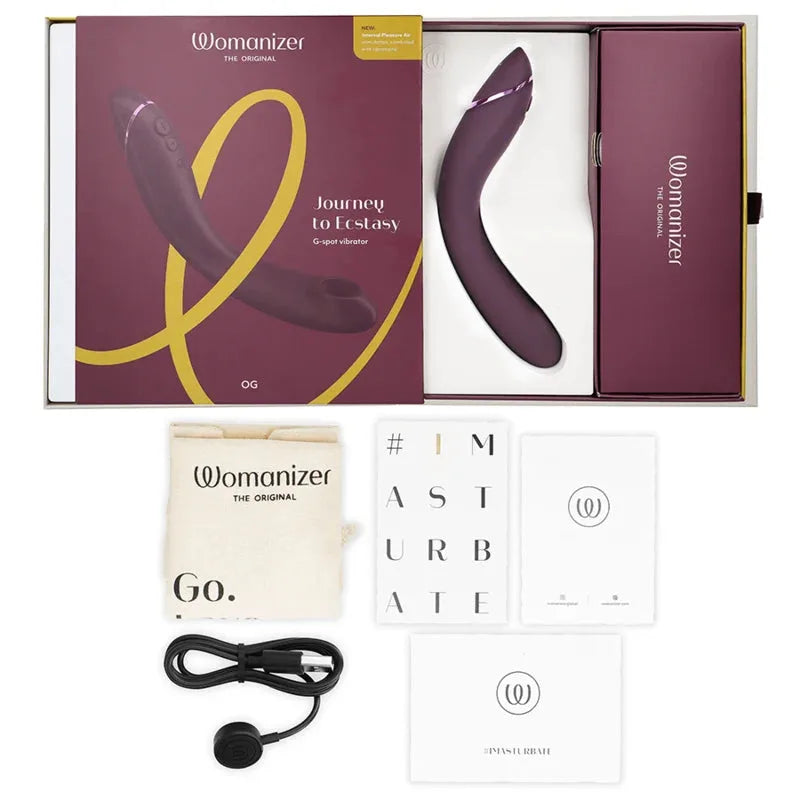 Vibromasseur Womanizer OG en silicone violet pour plaisir du point G, étanche et rechargeable, avec accessoires inclus.