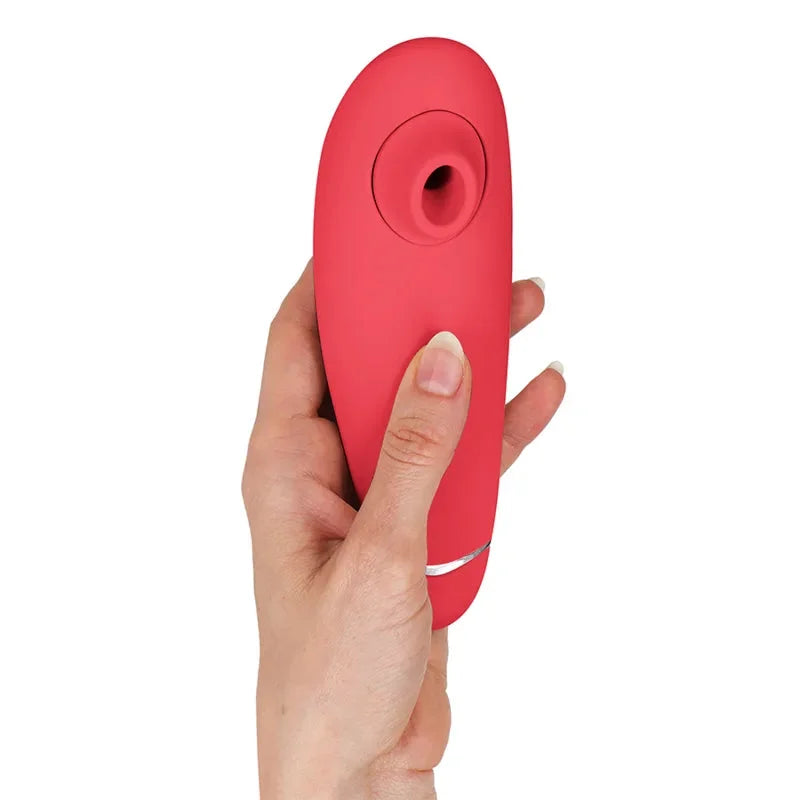 Aspirateur clitoridien rouge, silicone doux, stimulation précise, ergonomique, plaisir intense pour moments intimes.