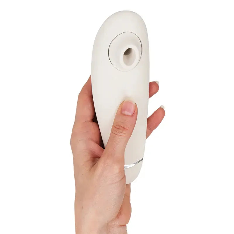 Stimulateur de clitoris blanc ergonomique, design élégant pour plaisir intensif et discret, idéal pour moments intimes.