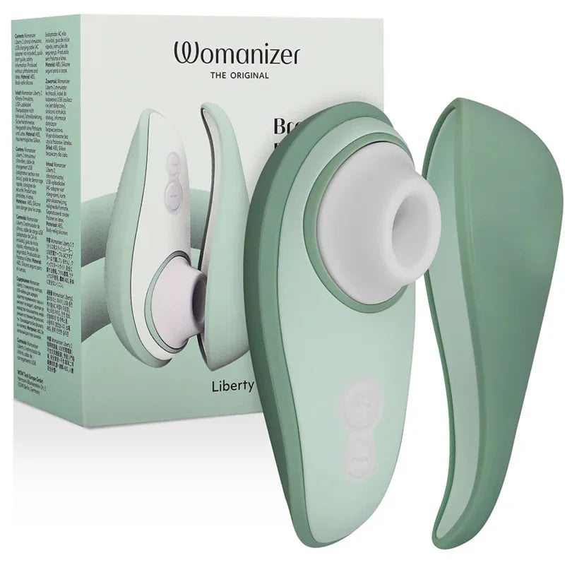 Stimulateur intime vert à ondes pulsées, Womanizer Liberty, élégant et discret pour plaisir féminin.