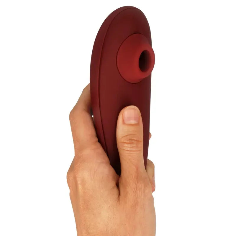 Massageur intime rouge ergonomique, en silicone doux, idéal pour stimulation précise et discrète.