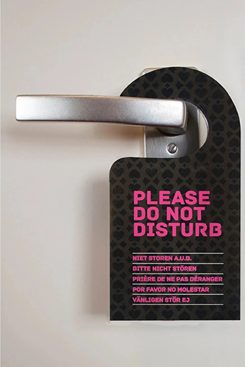 Plaque de porte 'Ne pas déranger', accessoire chic pour moments intimes et privés.