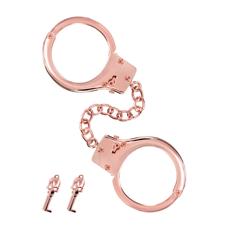 Menottes pour poignets en métal or rose