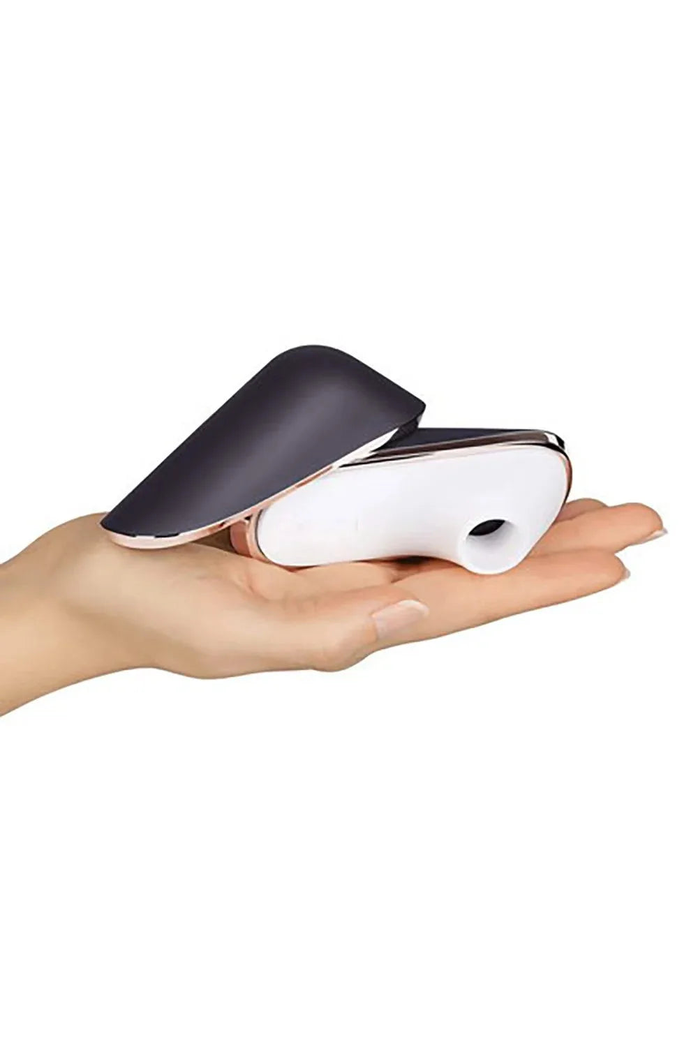 Stimulateur intime compact pour voyage, design élégant noir et blanc, idéal pour plaisir discret et portable.