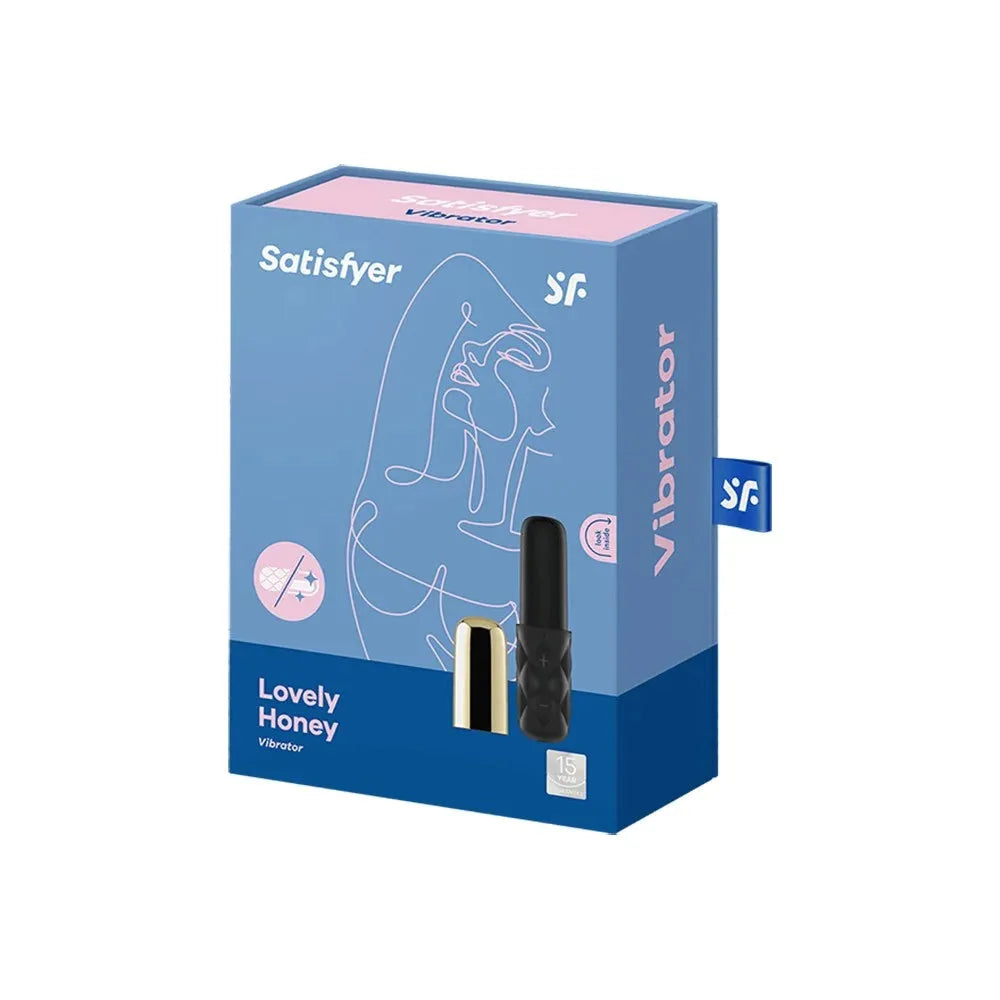 Stimulateur clitoridien noir et doré, compact et élégant, pour une expérience intime raffinée et intense.