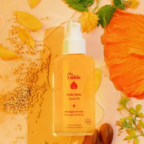 Huile de massage bio aux extraits naturels, soin corps relaxant et nourrissant, idéal pour les moments intimes et bien-être.