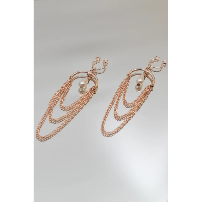 Bijoux de seins avec 3 chainettes doré rose et une perle