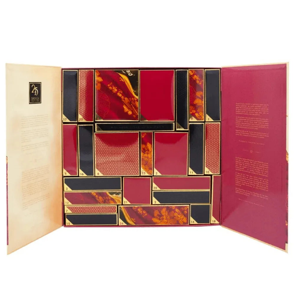 Calendrier de l'Avent sensuel, design rouge et doré, pour découvrir chaque jour une surprise intime et raffinée.