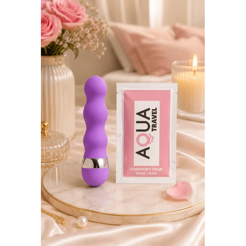 Mini Vibromasseur violet ondulés Pocket Pleasure + 1 dosette de lubrifiant
