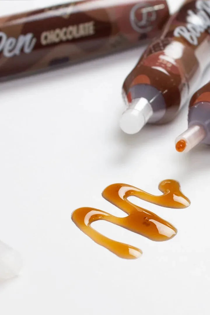 Stylo corporel chocolat comestible, idéal pour les jeux intimes sensuels et délicieux.